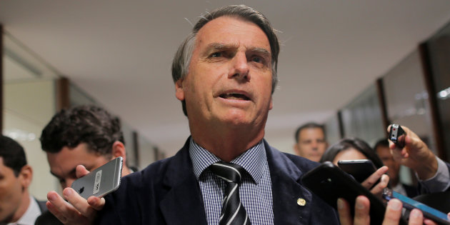 Presidential candidate Jair Bolsonaro speaks with journalists at the National Congress in Brasilia, Brazil September 4, 2018. REUTERS/Adriano Machado